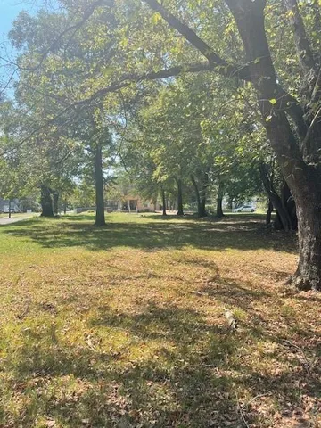 a view of a large body of water with water fall