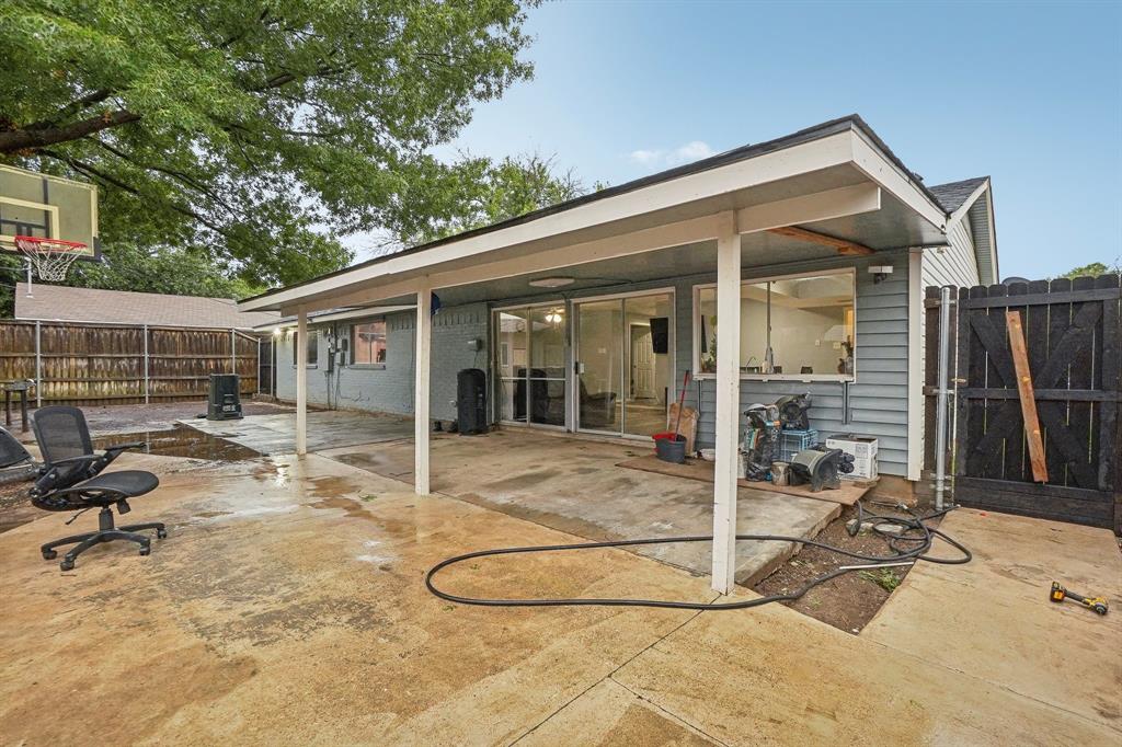 3601 Chime Street Irving, TX 75062 - Photo 15 of 17 a view of a house with backyard and sitting area