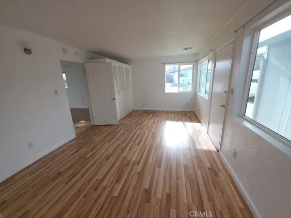 a view of entryway with wooden floor