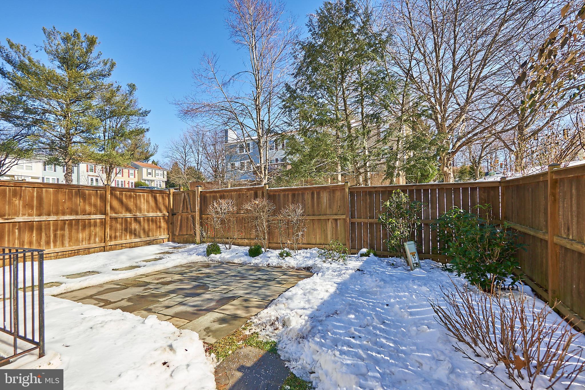 1676 Bayfield Way Reston, VA 20194 - Photo 27 of 30 Expanded backyard, landscaped with patio