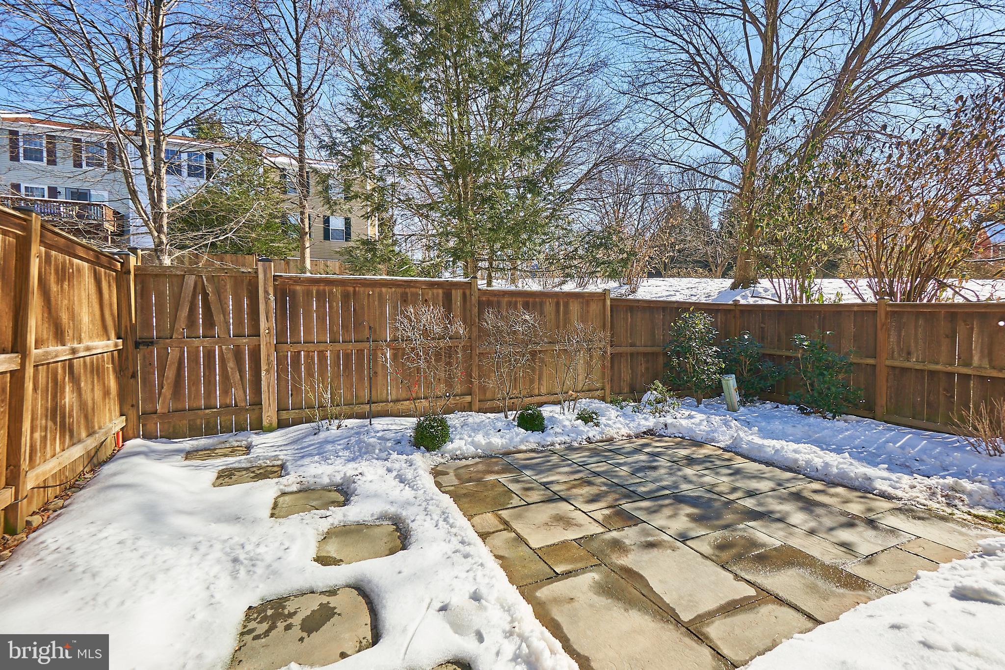 1676 Bayfield Way Reston, VA 20194 - Photo 28 of 30 Expanded backyard, landscaped with patio