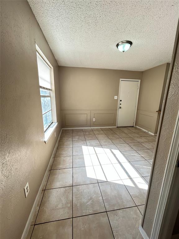 2818 South Fielder Road Arlington, TX 76015 - Photo 14 of 31 a view of an empty room and window