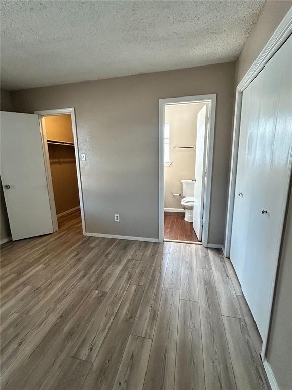 2818 South Fielder Road Arlington, TX 76015 - Photo 20 of 31 a view of empty room with wooden floor