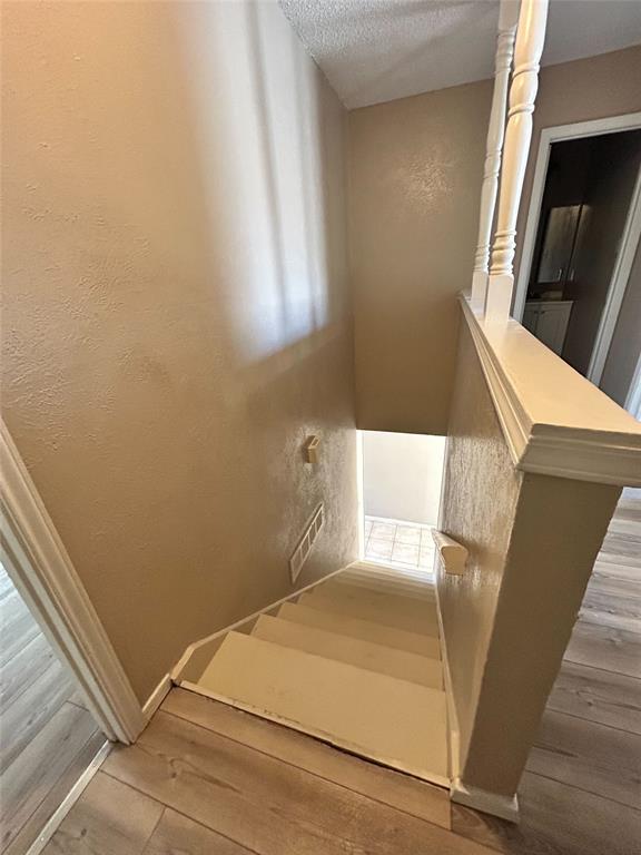 2818 South Fielder Road Arlington, TX 76015 - Photo 6 of 31 a view of balcony with wooden floor