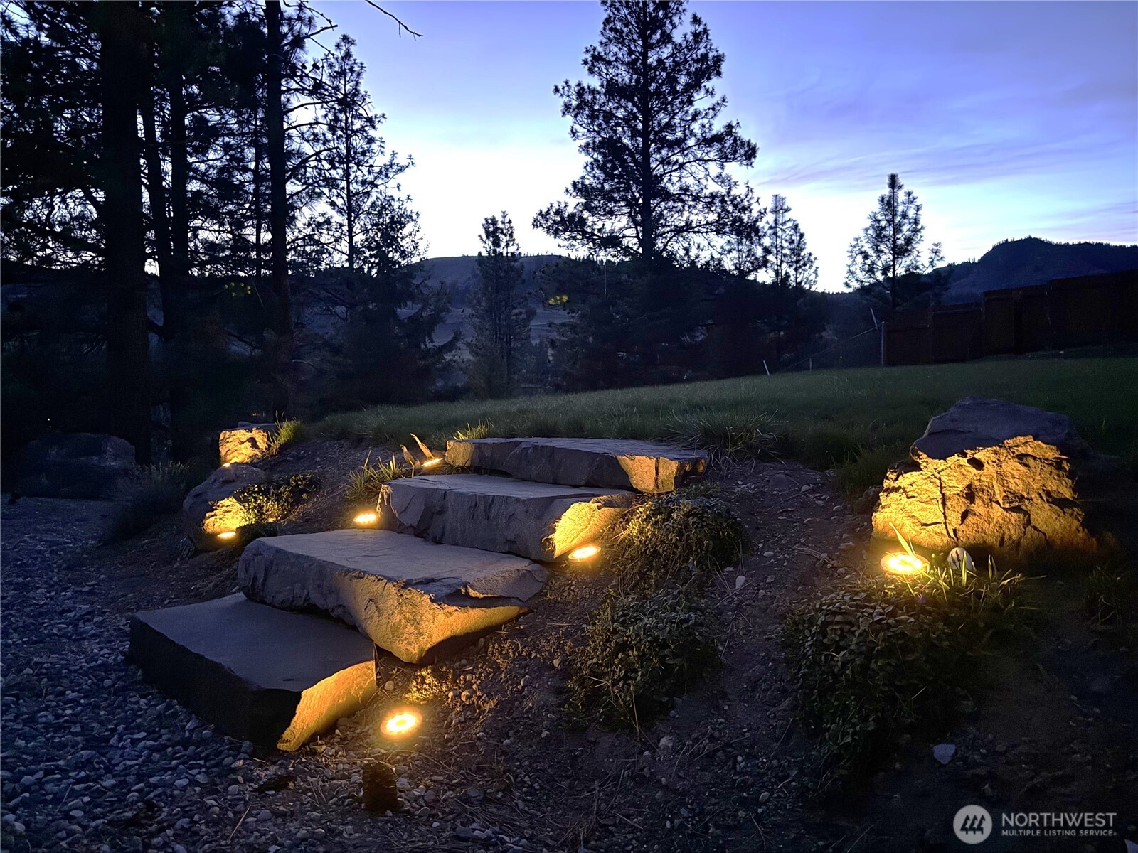 8 Julian Bay Road Republic, WA 99166 - Photo 26 of 40 a view of a patio with table and chairs and a fire pit