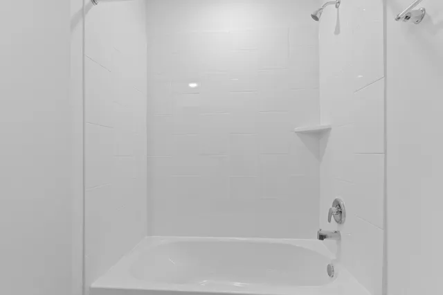 a close up of a bathtub