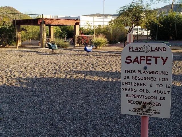 a kitchen with stainless steel appliances a refrigerator and a stove