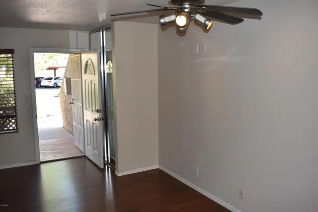 a close view of a refrigerator in kitchen and a sink