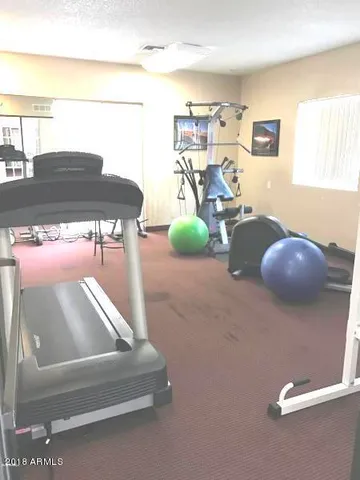 a stove top oven sitting inside of a kitchen