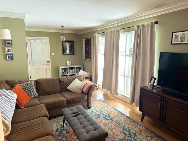 4992 Princeton Road Memphis, TN 38117 - Photo 3 of 13 a living room with furniture and a flat screen tv