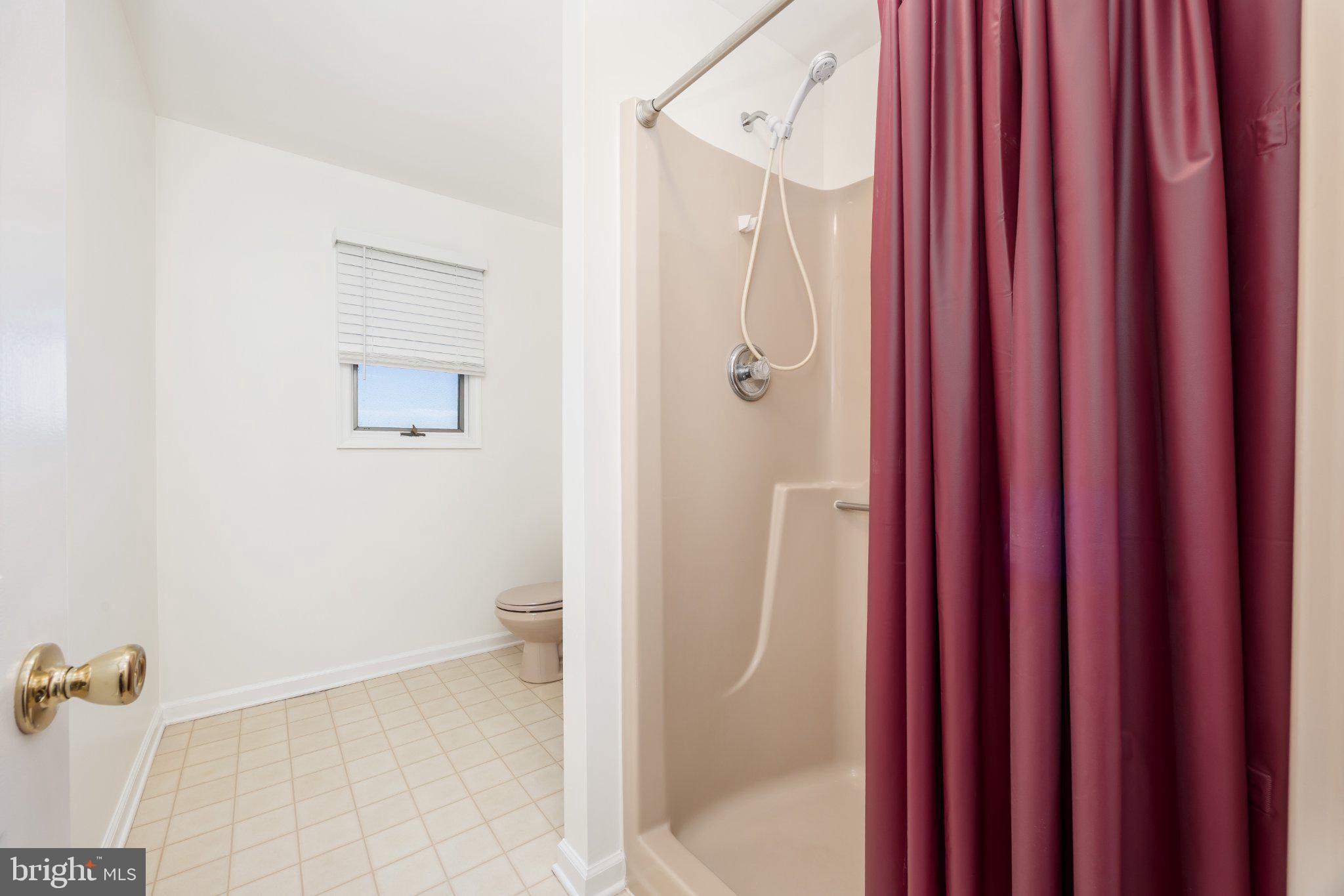 10431 Brighton Road Ocean City, MD 21842 - Photo 20 of 39 Bright and functional bathroom space.