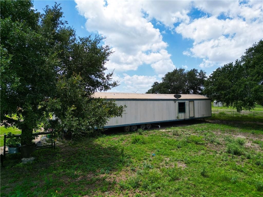 0 Fm 673 Pawnee, TX 78145 - Photo 18 of 19 a backyard of a house with lots of green space
