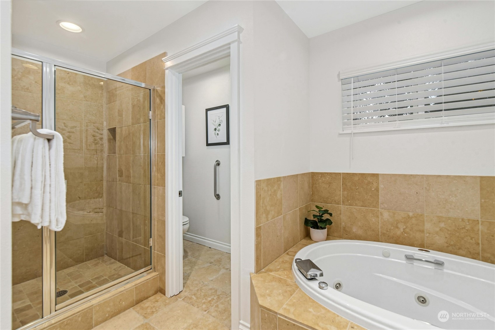 24040 Brier Road Brier, WA 98036 - Photo 17 of 37 a bathroom with a bathtub