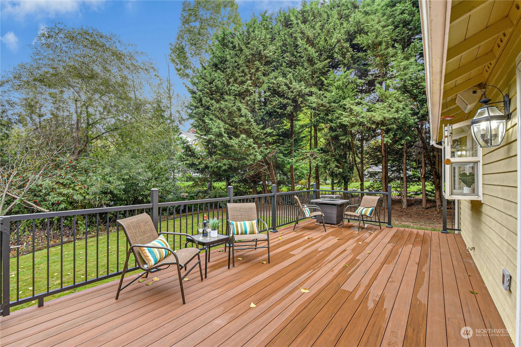 24040 Brier Road Brier, WA 98036 - Photo 28 of 37 a view of roof deck with chairs and wooden floor