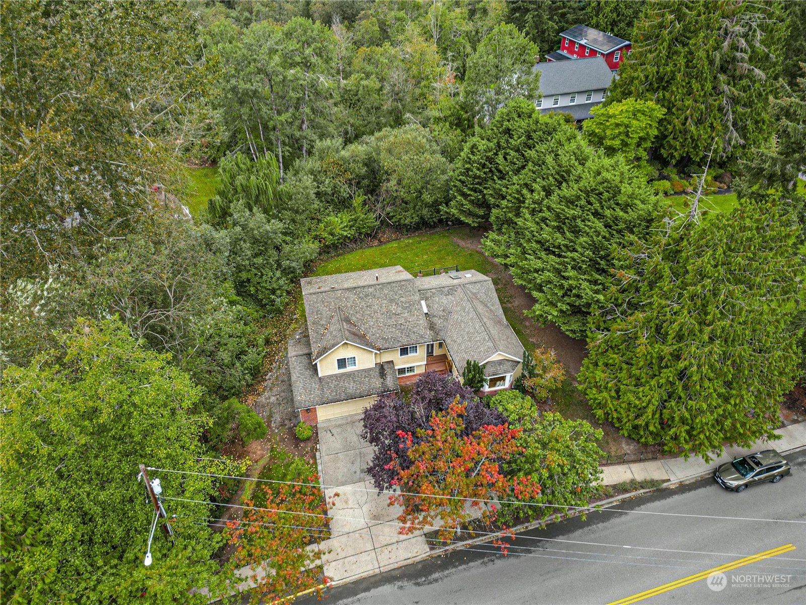 24040 Brier Road Brier, WA 98036 - Photo 33 of 37 an aerial view of a house with a yard and garden