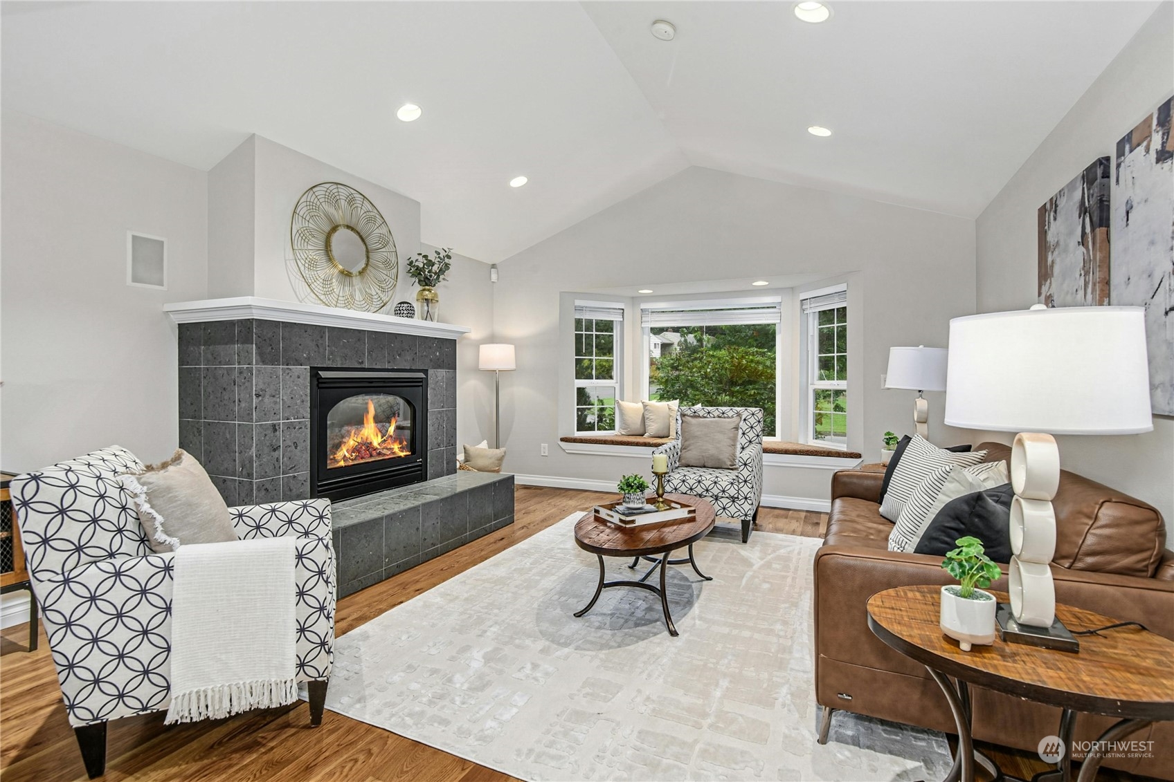 24040 Brier Road Brier, WA 98036 - Photo 5 of 37 a living room with furniture and a fireplace
