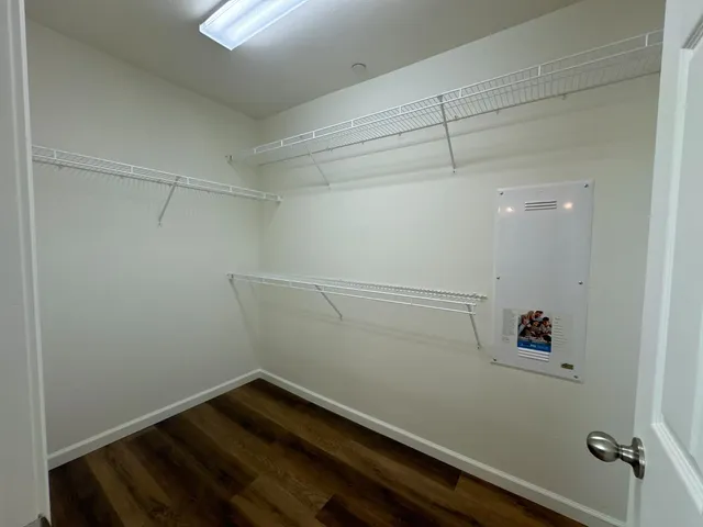 a view of a room with racks on the wall