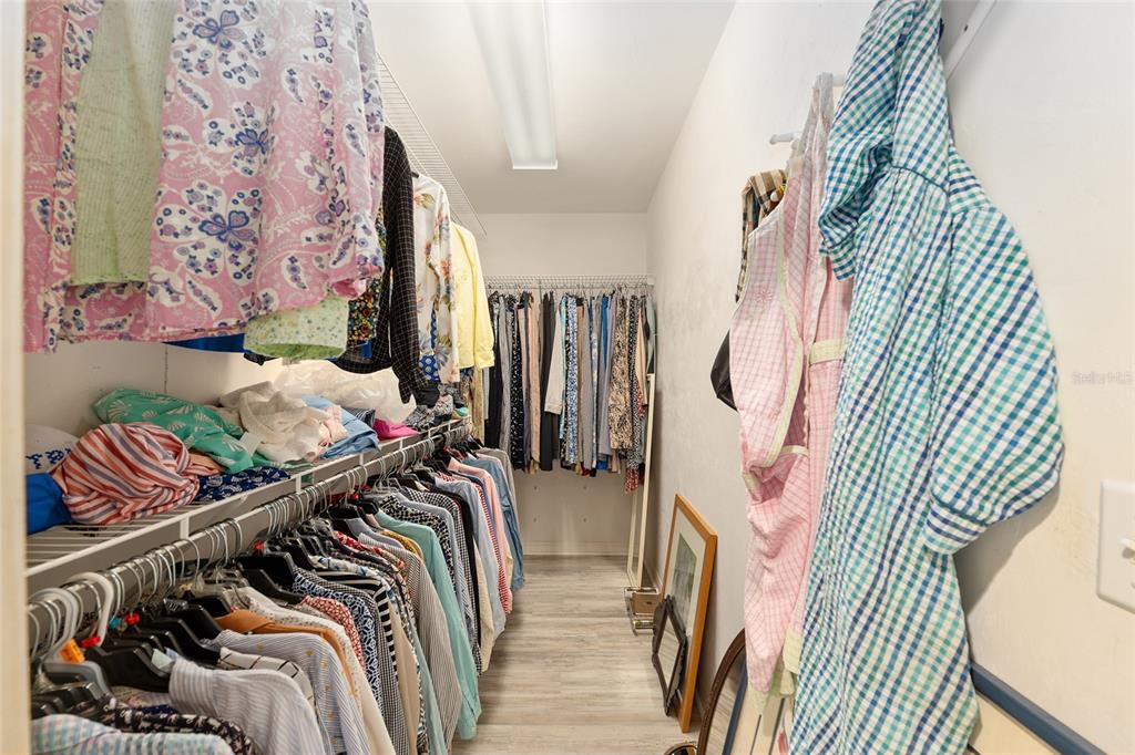 10160 Southwest 48th Place Gainesville, FL 32608 - Photo 29 of 68 a view of walk in closet with clothes
