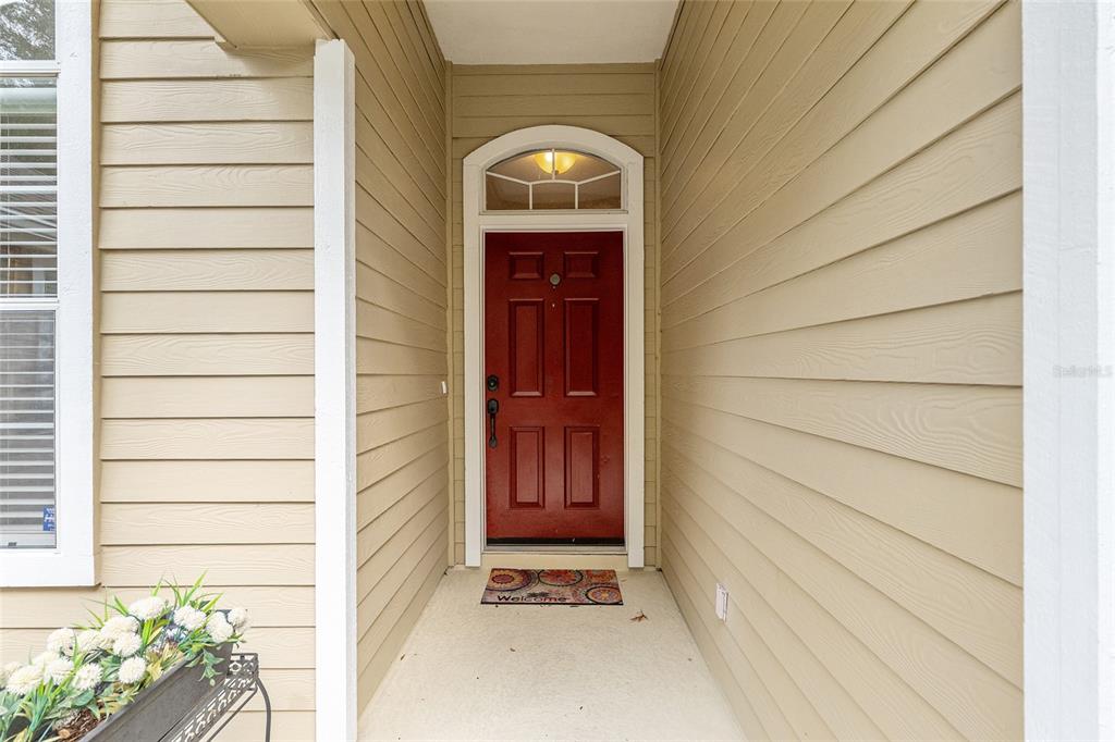 10160 Southwest 48th Place Gainesville, FL 32608 - Photo 3 of 68 a view of front door of a house