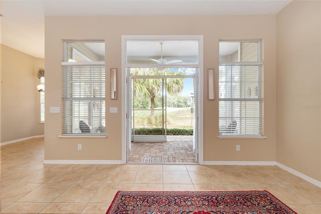 10160 Southwest 48th Place Gainesville, FL 32608 - Photo 38 of 68 wooden floor in an empty room with a window