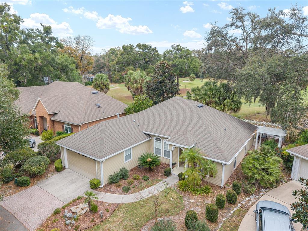 10160 Southwest 48th Place Gainesville, FL 32608 - Photo 50 of 68 an aerial view of a house with yard and mountain view in back