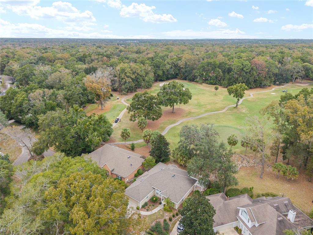 10160 Southwest 48th Place Gainesville, FL 32608 - Photo 53 of 68 an aerial view of residential houses with outdoor space