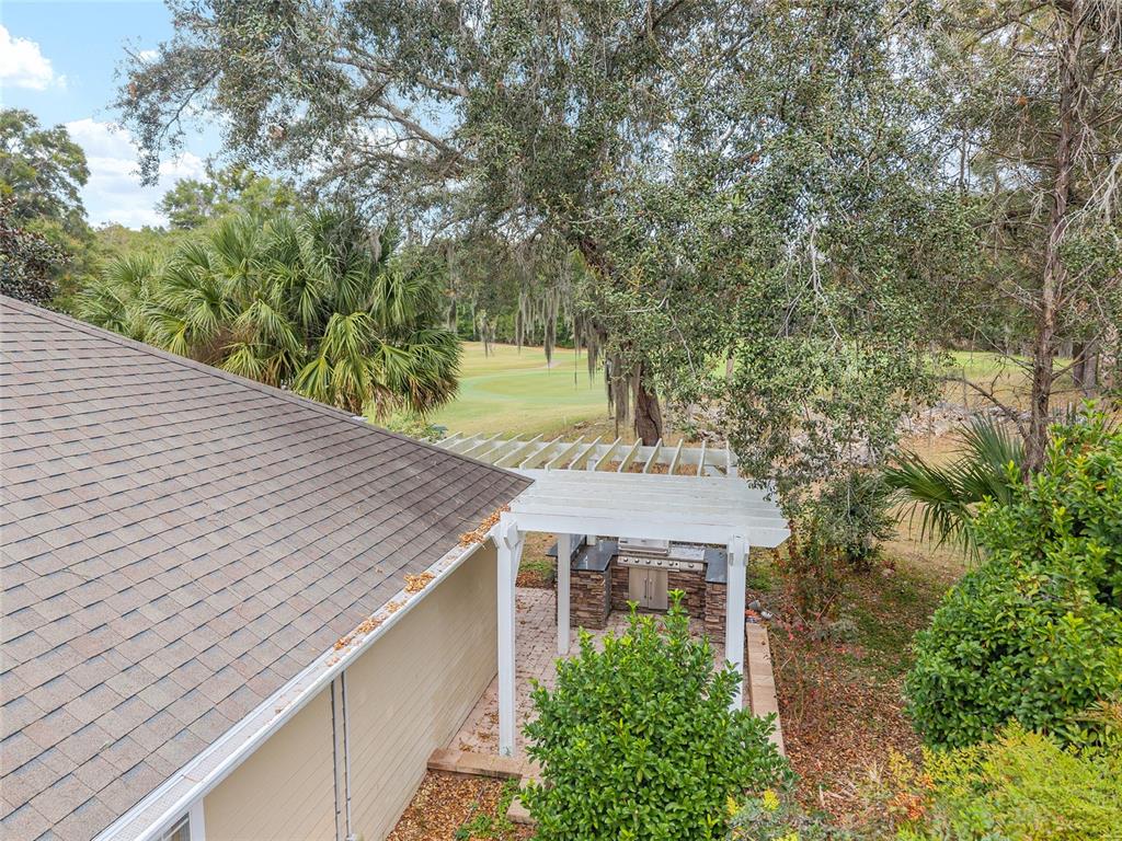 10160 Southwest 48th Place Gainesville, FL 32608 - Photo 56 of 68 a aerial view of a house with a yard