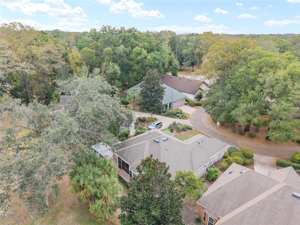 10160 Southwest 48th Place Gainesville, FL 32608 - Photo 58 of 68 an aerial view of a house with a garden