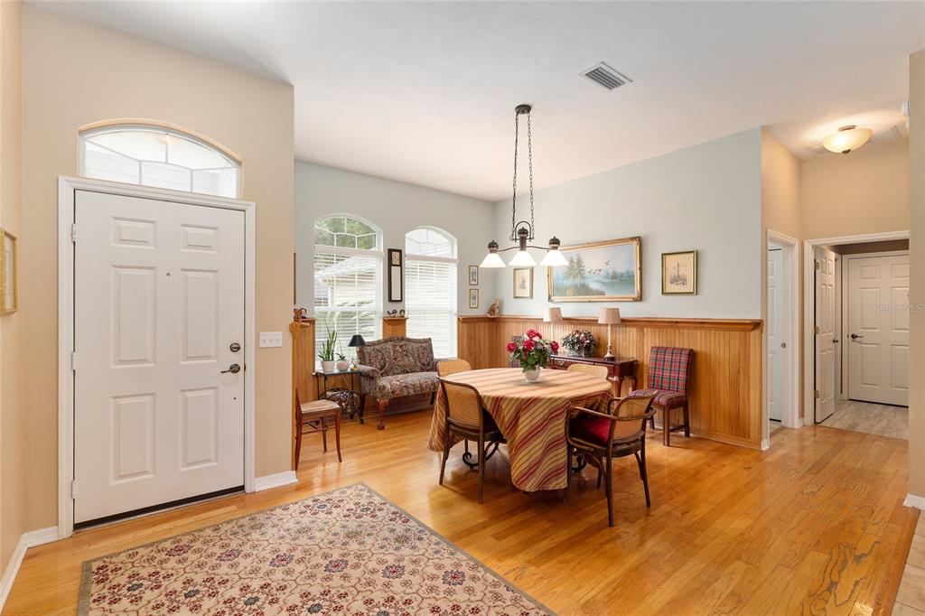 10160 Southwest 48th Place Gainesville, FL 32608 - Photo 6 of 68 a view of a dining room with furniture