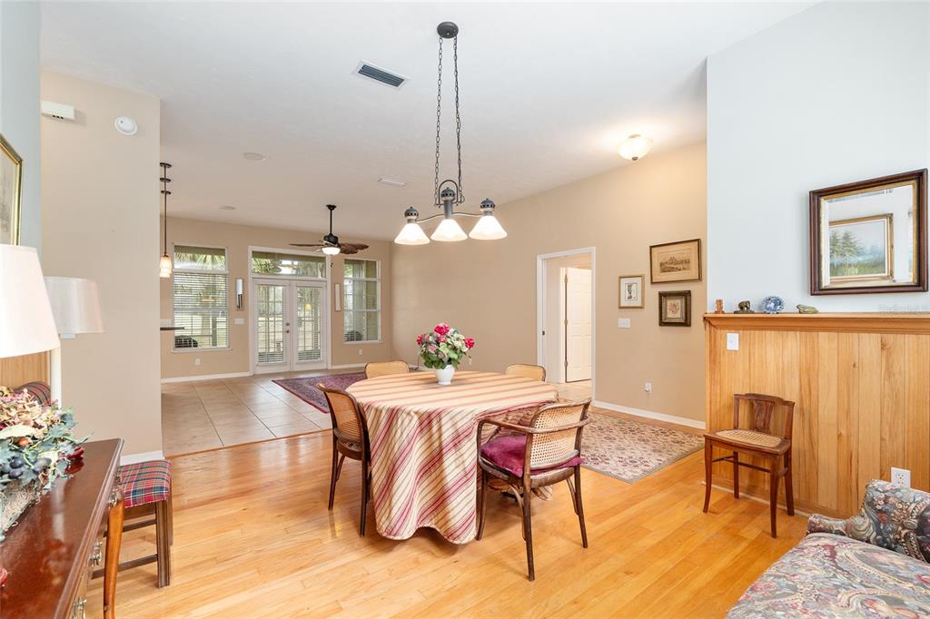 10160 Southwest 48th Place Gainesville, FL 32608 - Photo 8 of 68 a dining room with furniture and window