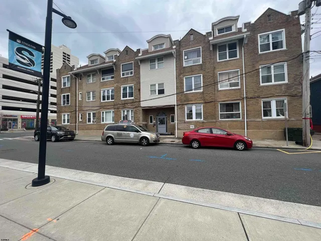 a cars parked in front of a building