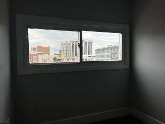 a view of a room that has a window in it