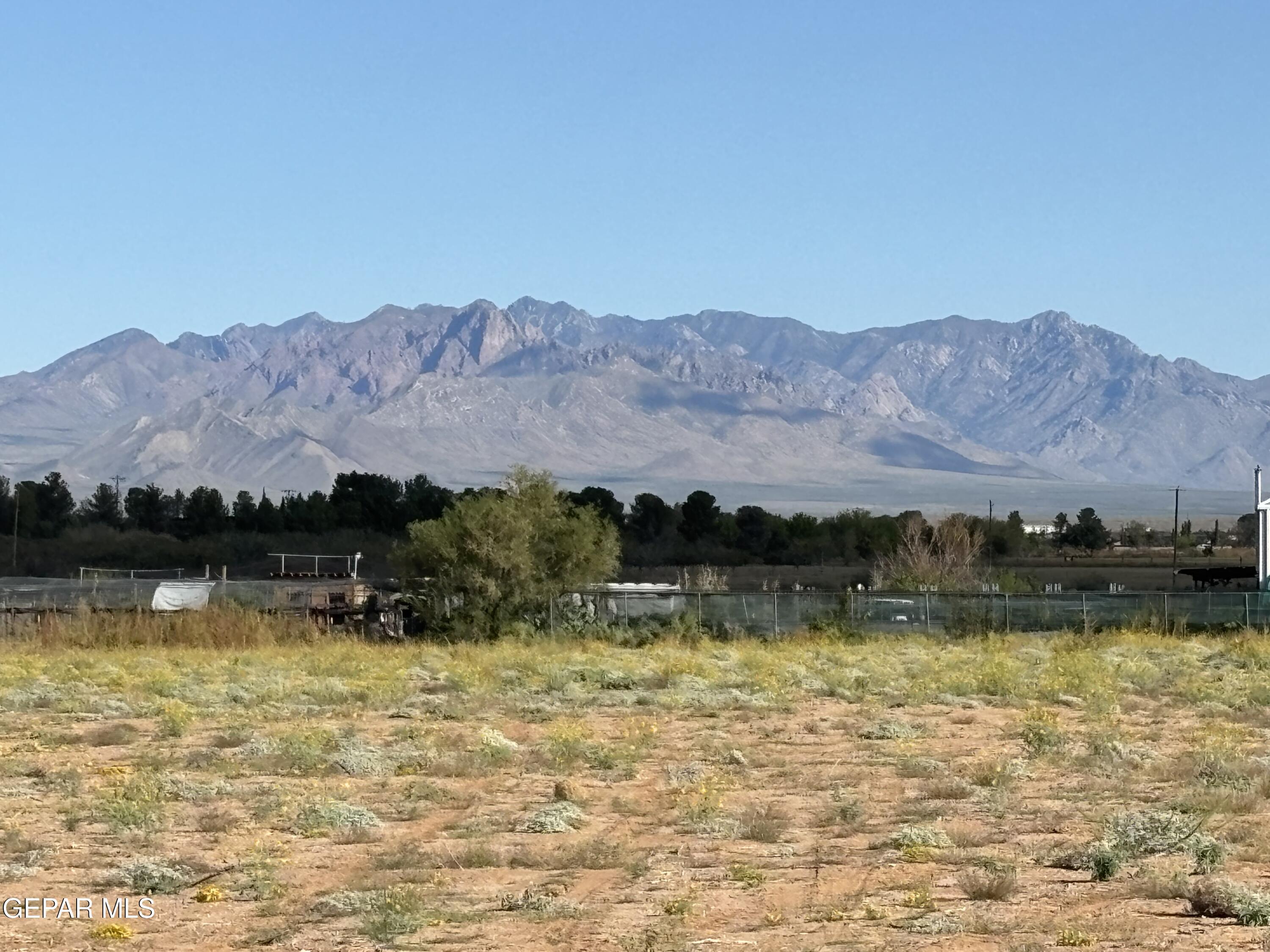 1001 Finley Street Chaparral, NM 88081 - Photo 15 of 16 a view of lake with mountain