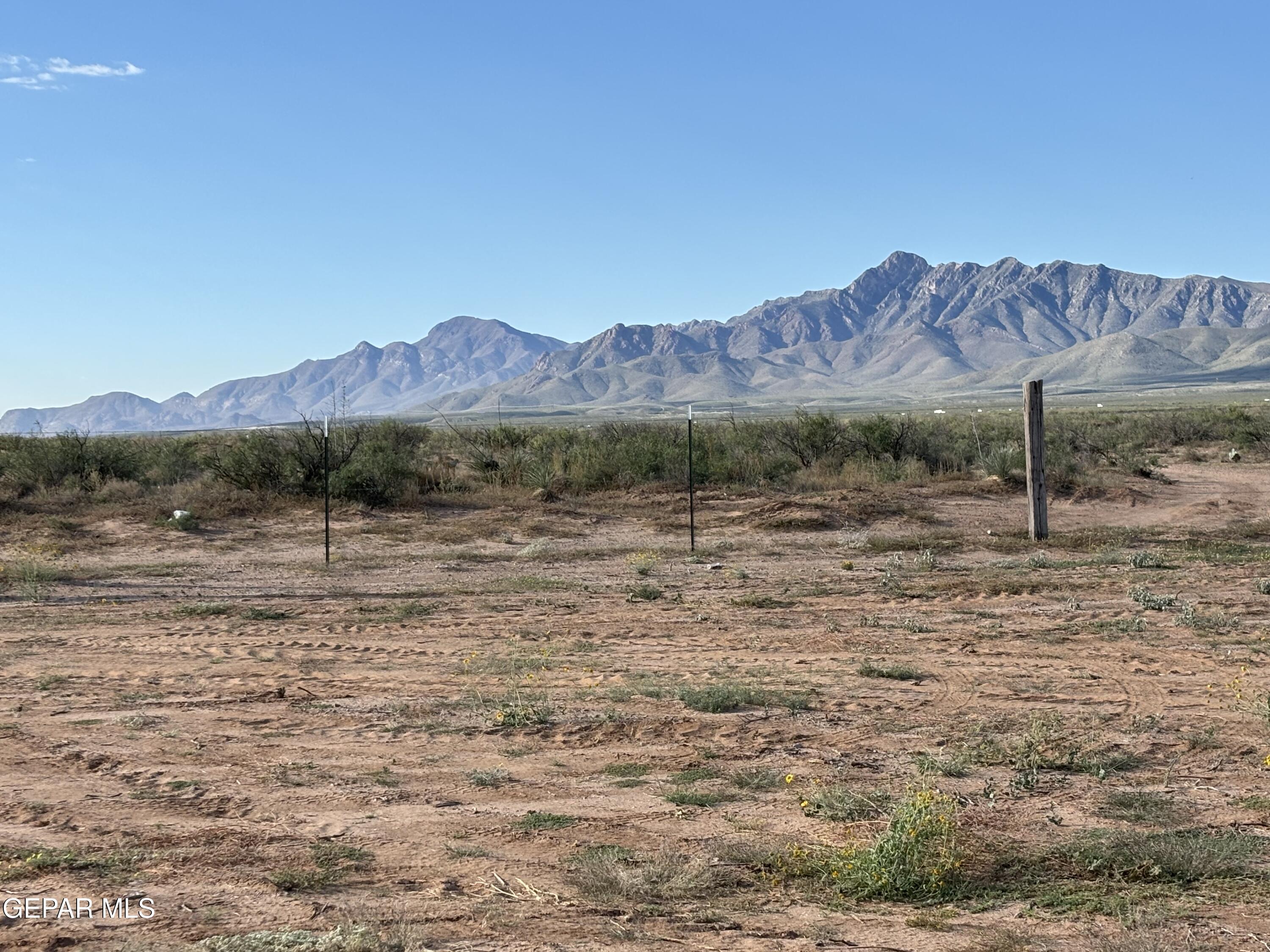 1001 Finley Street Chaparral, NM 88081 - Photo 16 of 16 a view of a town with mountains in the background