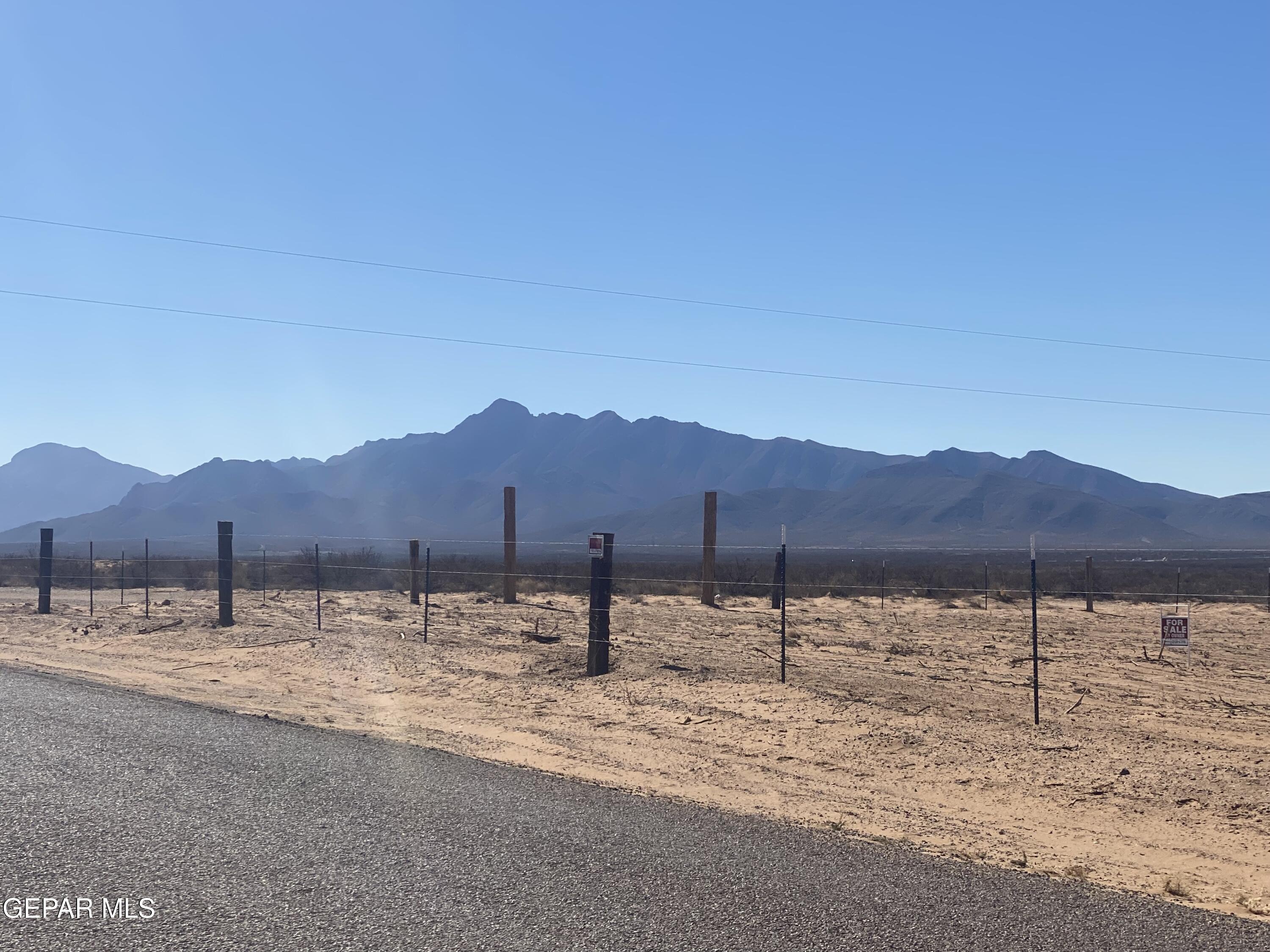 1001 Finley Street Chaparral, NM 88081 - Photo 4 of 16 a view of a house with a yard
