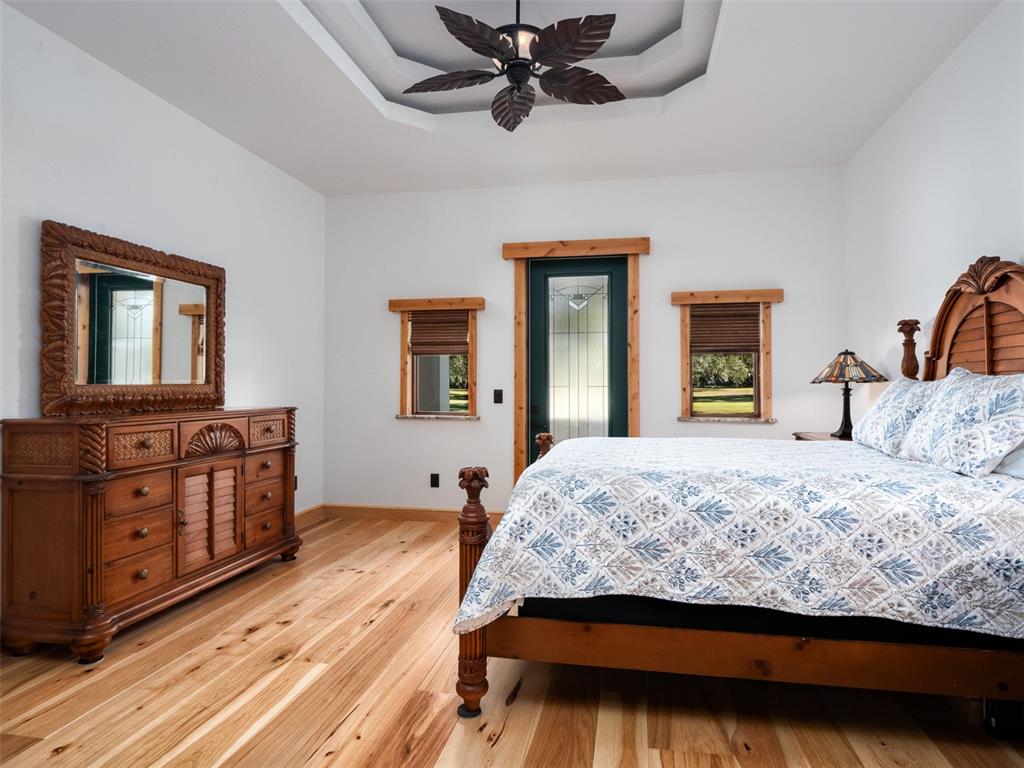 3 Carry Back Road Ocala, FL 34482 - Photo 11 of 37 a bedroom with a bed and a dresser