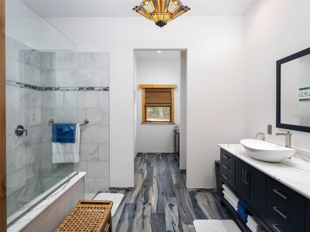 3 Carry Back Road Ocala, FL 34482 - Photo 12 of 37 a bathroom with a sink a toilet and shower