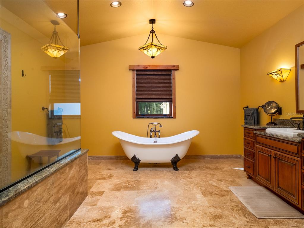 3 Carry Back Road Ocala, FL 34482 - Photo 16 of 37 a bathroom with a sink and a mirror