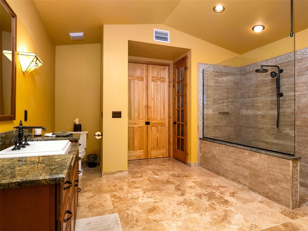 3 Carry Back Road Ocala, FL 34482 - Photo 17 of 37 a bathroom with a sink and a mirror