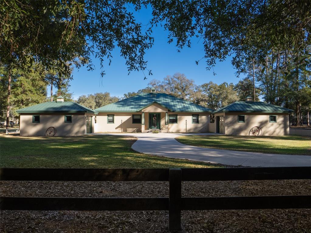 3 Carry Back Road Ocala, FL 34482 - Photo 2 of 37 a view of a yard in front of a house