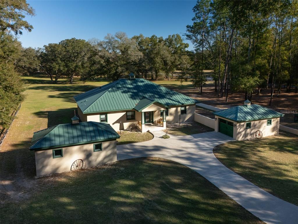 3 Carry Back Road Ocala, FL 34482 - Photo 27 of 37 a view of a lake with couches chairs