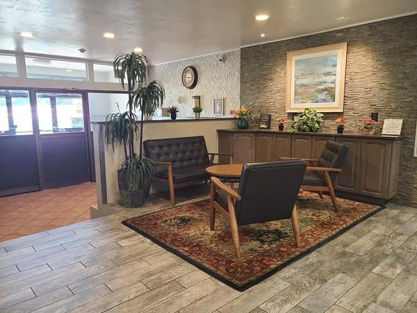 a view of a dining room with furniture
