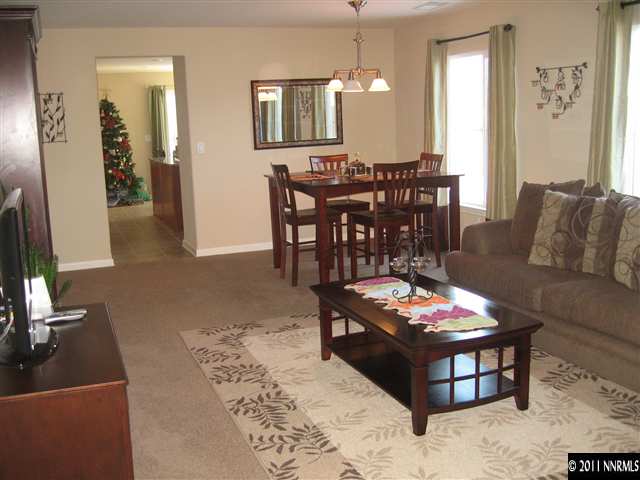 8960 Yeager Street Reno, NV 89506 - Photo 4 of 10 a living room with furniture and wooden floor