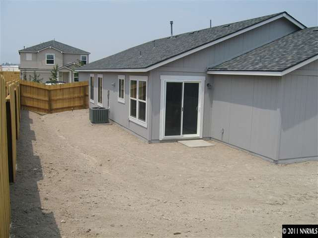 8960 Yeager Street Reno, NV 89506 - Photo 10 of 10 a view of a house with a roof deck
