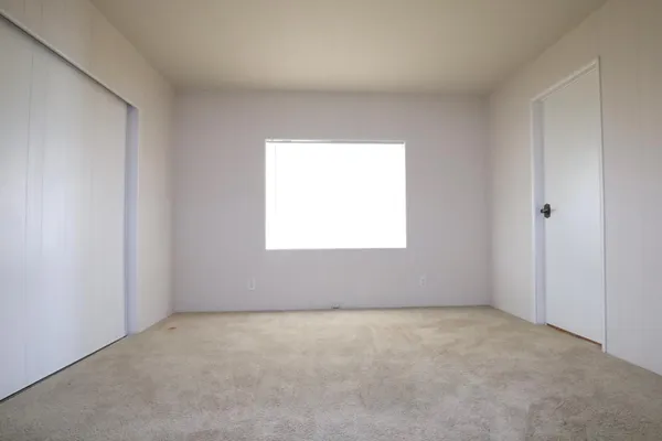 an empty room with a window