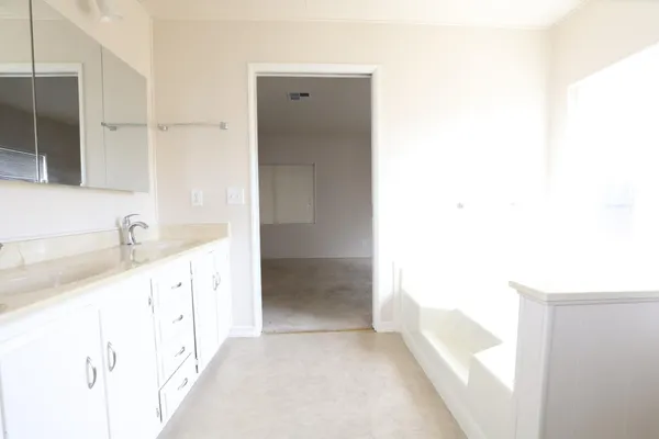 a view of balcony with wooden floor