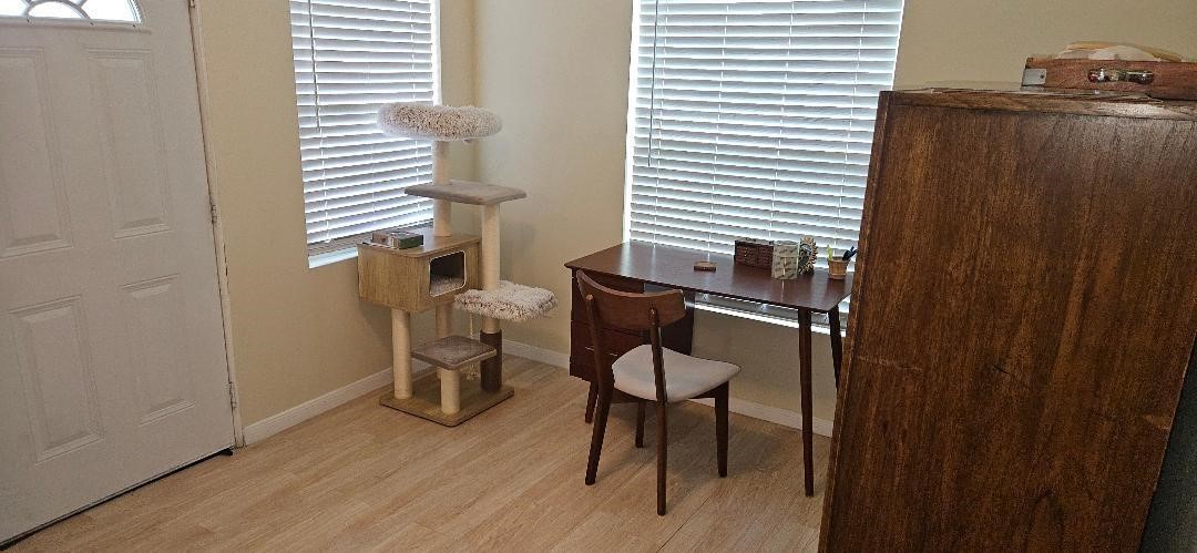932 Walling Street Houston, TX 77009 - Photo 21 of 23 a room that has a window and chair in it