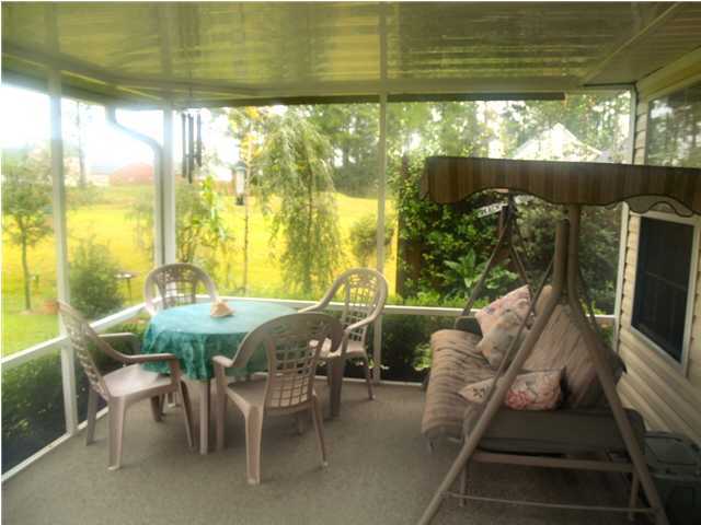 203 Bay Grove Road Freeport, FL 32439 - Photo 11 of 12 a view of an outdoor dining space with furniture