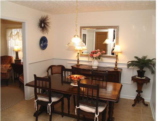 203 Bay Grove Road Freeport, FL 32439 - Photo 12 of 12 a dining room with furniture and window