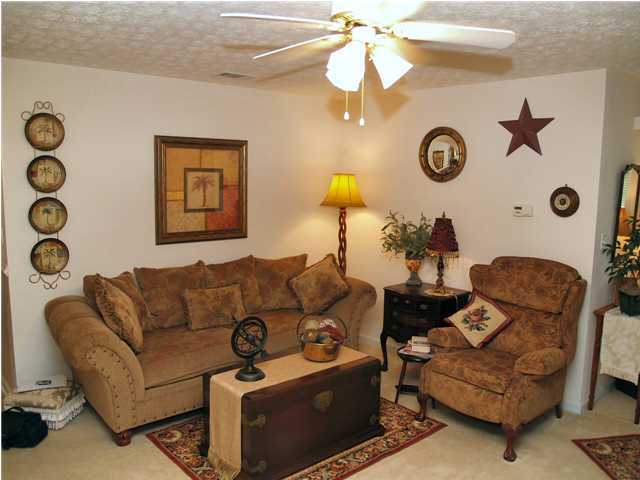 203 Bay Grove Road Freeport, FL 32439 - Photo 3 of 12 a living room with furniture and a large window